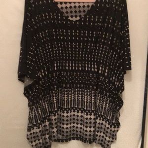 Beaded black and taupe top.